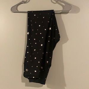 ⭐️ 3 for $10 Black leggings with gold star design on them